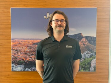 Staff member Logan Mangene from ID_e09955bd3160