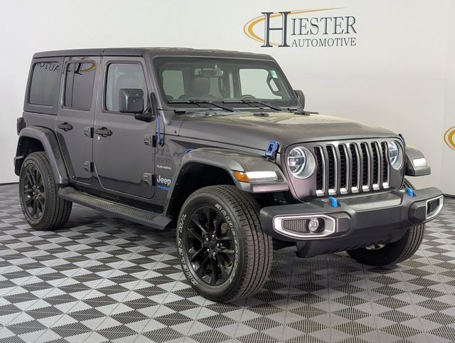 Used 2022 Jeep Wrangler Unlimited Sahara 4XE with VIN 1C4JJXP66NW280516 for sale in Lillington, NC
