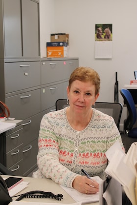 Staff member SUE BELL from ID_d3f36a14c2df