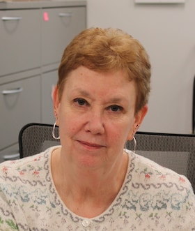 Staff member Sue Bell from ID_d3f36a14c2df