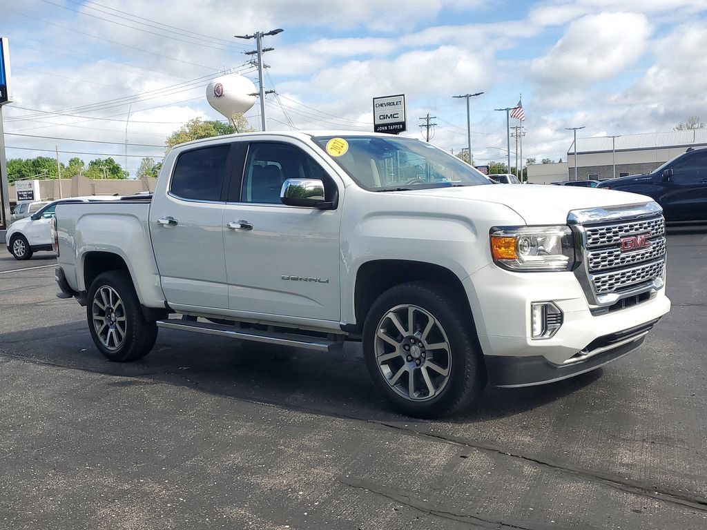 Used 2021 GMC Canyon Denali with VIN 1GTG6EEN9M1294853 for sale in Paw, MI