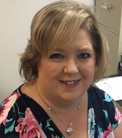 Staff member Trissa McLaughlin from ID_a0925511c196