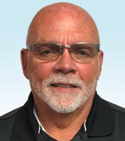 Staff member Bob Charles from ID_a0925511c196