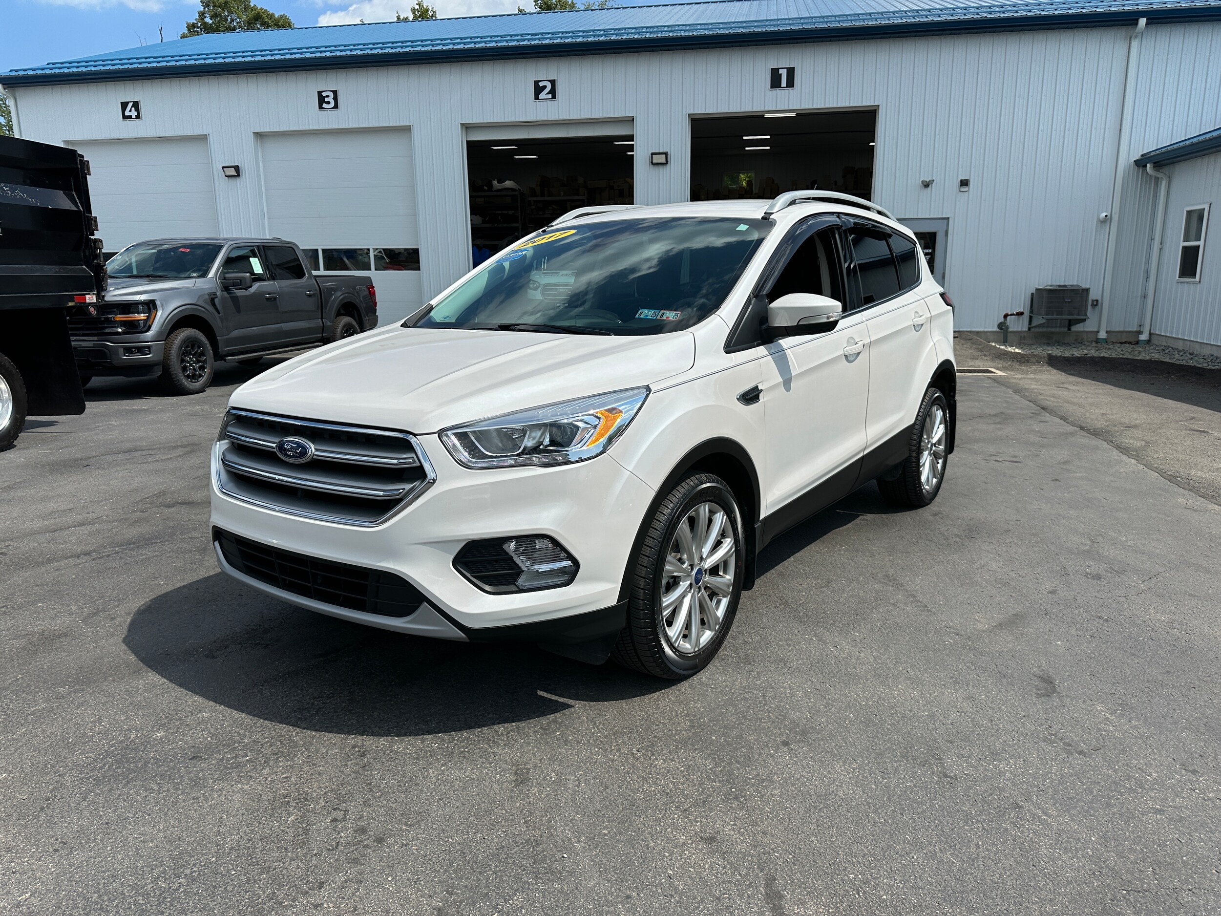 Used 2017 Ford Escape Titanium with VIN 1FMCU9JD6HUE67754 for sale in Connellsville, PA