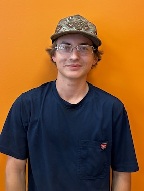 Staff member Zach from ID_a0925511c196