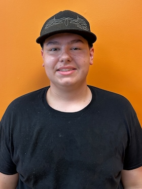 Staff member Riley from ID_a0925511c196