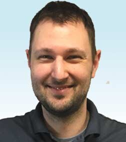 Staff member John from ID_a0925511c196