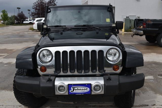 Used 2012 Jeep Wrangler Unlimited Sahara with VIN 1C4HJWEG9CL261879 for sale in Laramie, WY