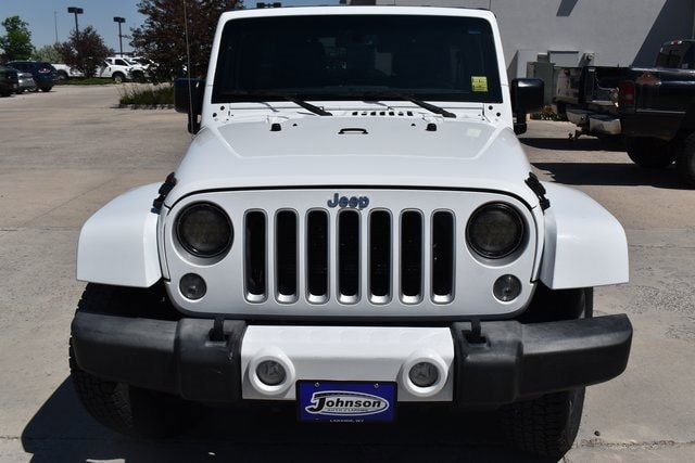Used 2016 Jeep Wrangler Unlimited Sahara with VIN 1C4BJWEG1GL229049 for sale in Laramie, WY