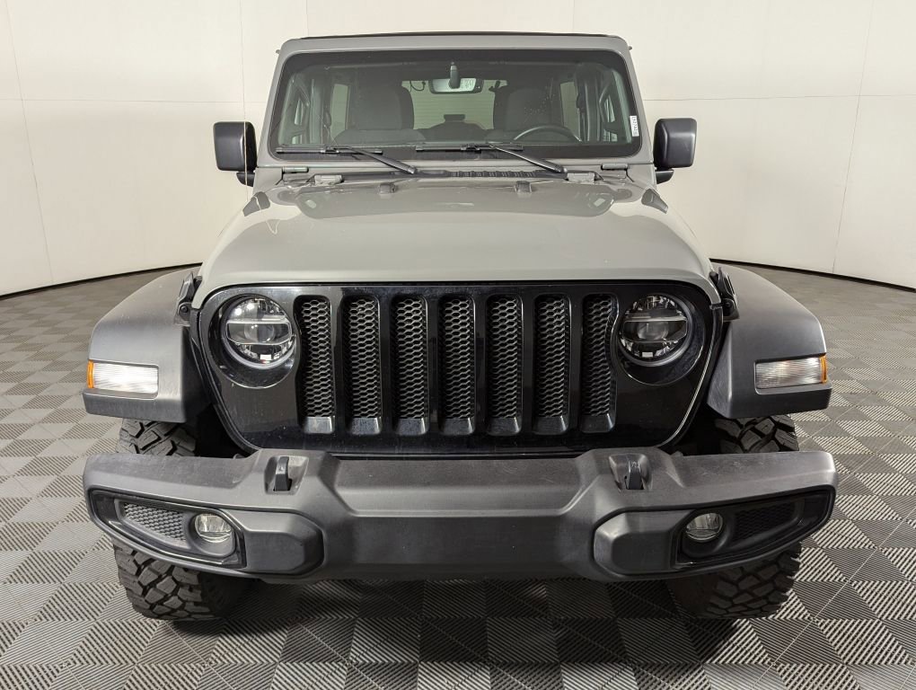 Used 2021 Jeep Wrangler Unlimited Willys with VIN 1C4HJXDN4MW668210 for sale in Brighton, CO