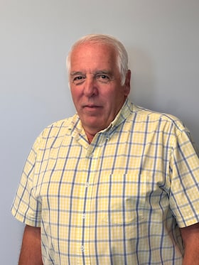 Staff member Chris Maneotis from ID_8072d7