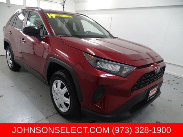 Red (Ruby Flare Pearl) 2019 Toyota RAV4 LE FWD SUV / Crossover Front-Wheel Drive 8-Speed Automatic