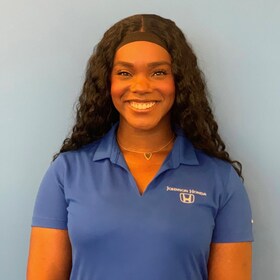 Staff member Ashley St. Julien from 48a9cb354161