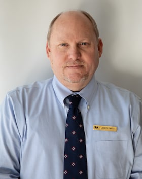 Staff member Joseph White from 61daf57809ce