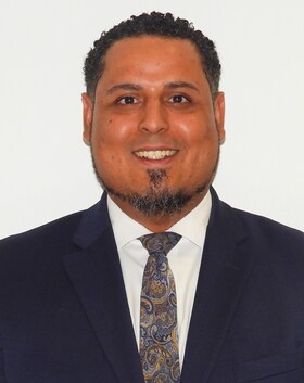 Staff member Danny Peña from 9733e143e1a8