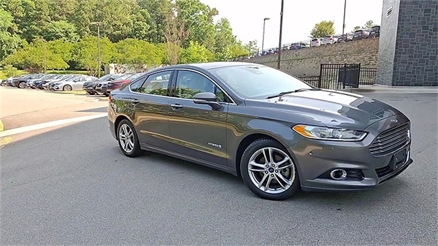 Used 2016 Ford Fusion Hybrid Titanium with VIN 3FA6P0RU8GR288247 for sale in Cary, NC