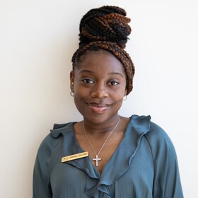 Staff member Arriana Ballard from 8d01e02873e4