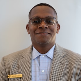 Staff member Marcus Riddick from 64e1ddc448c5