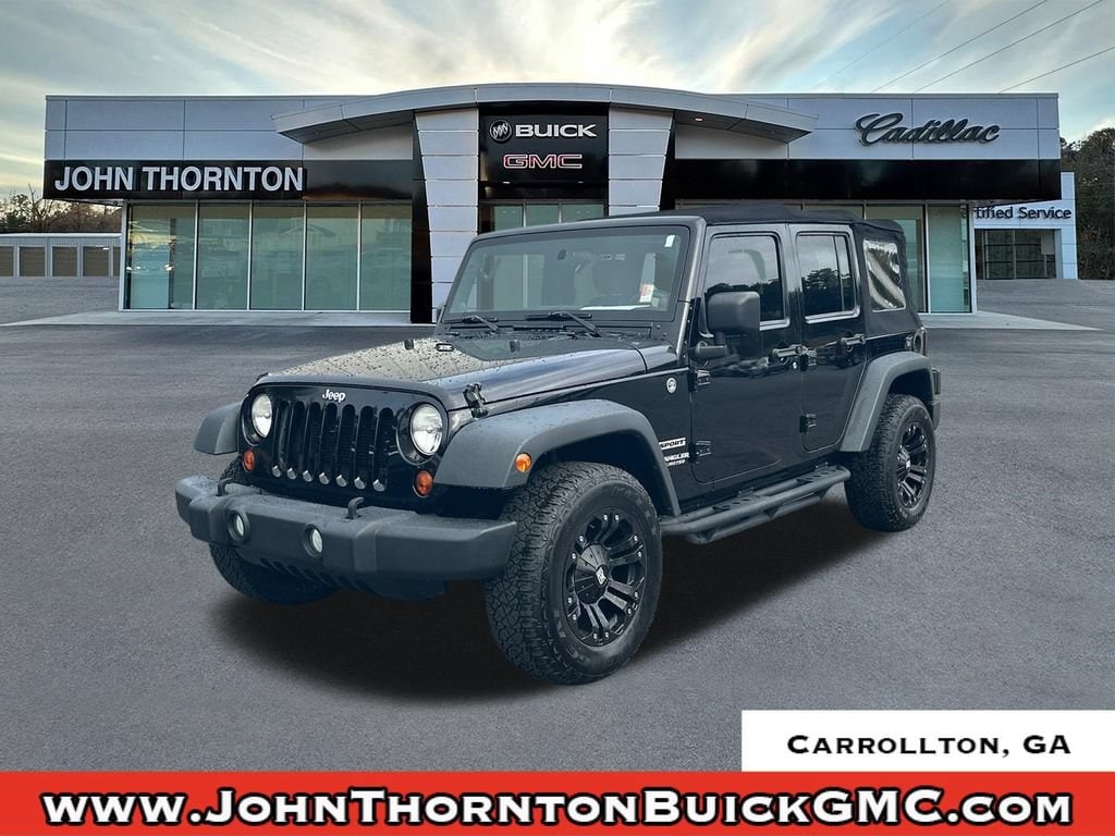 Used 2013 Jeep Wrangler Unlimited Sport with VIN 1C4BJWDG5DL706787 for sale in Carrollton, GA