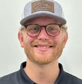 Staff member SIMON SHOEMAKE from ID_2332099f7695