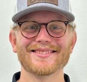 Staff member SIMON SHOEMAKE from ID_eaea66516273