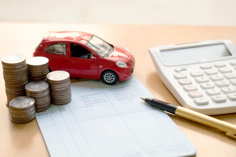 Toy Car Next to Money