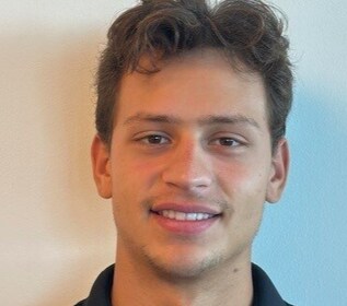 Staff member Tyler Rossi from ID_8830cf0467f1