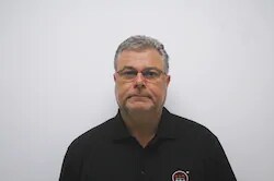 Staff member Mike Earls from 183c97e24df4