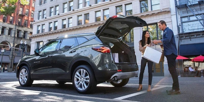  Person cheerfully signing documents.