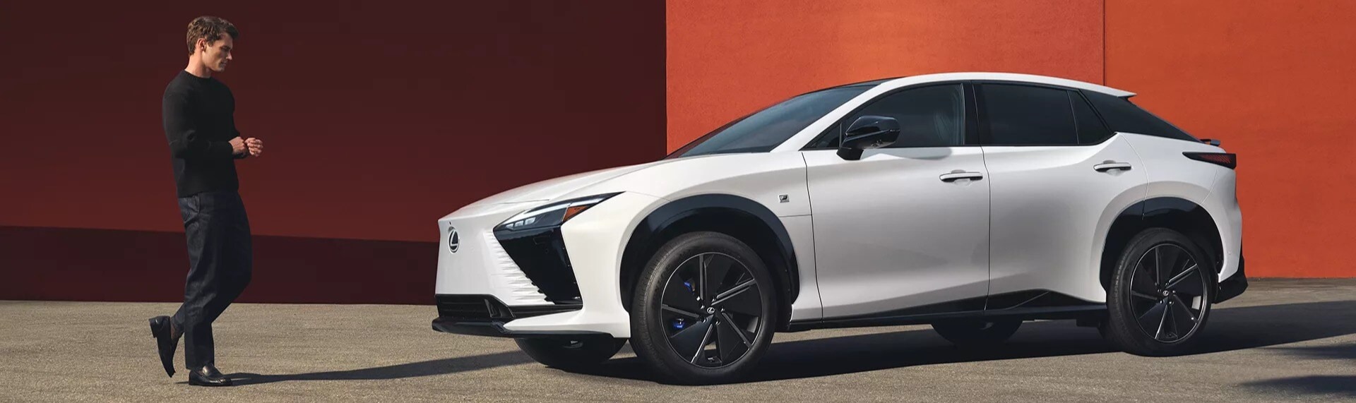 white Lexus RZ parked