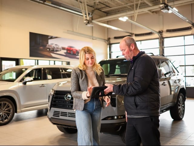 Jordan Lexus service technician helping a customer