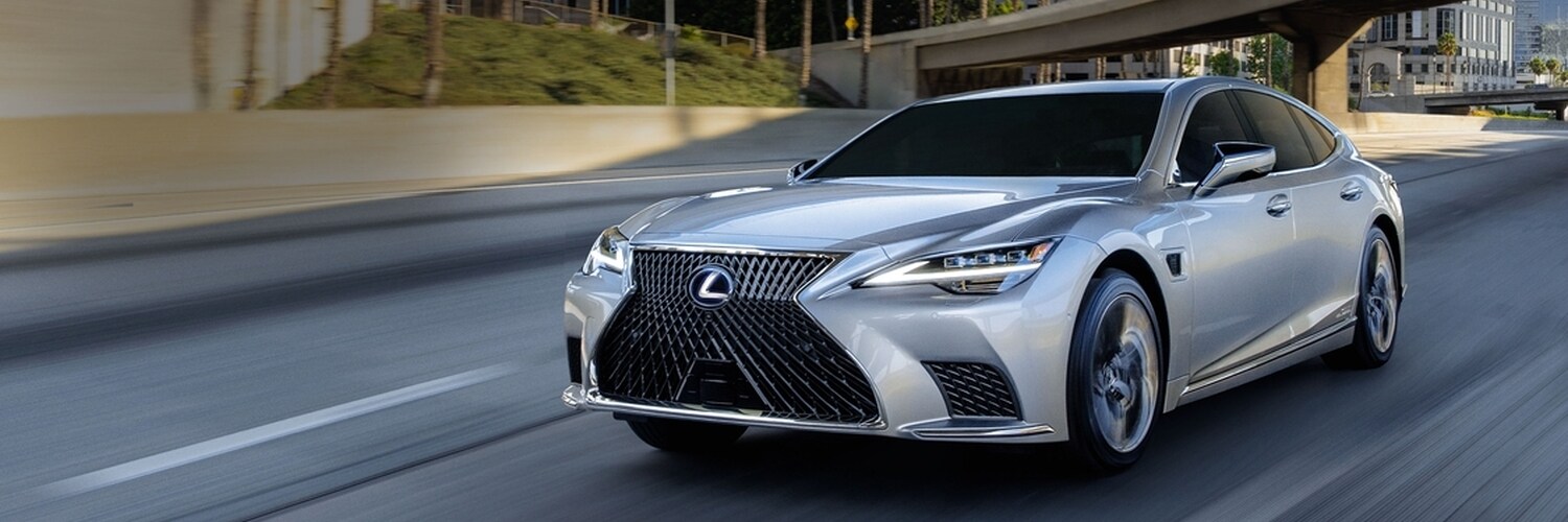 2023 Lexus LS 500 driving on a city freeway