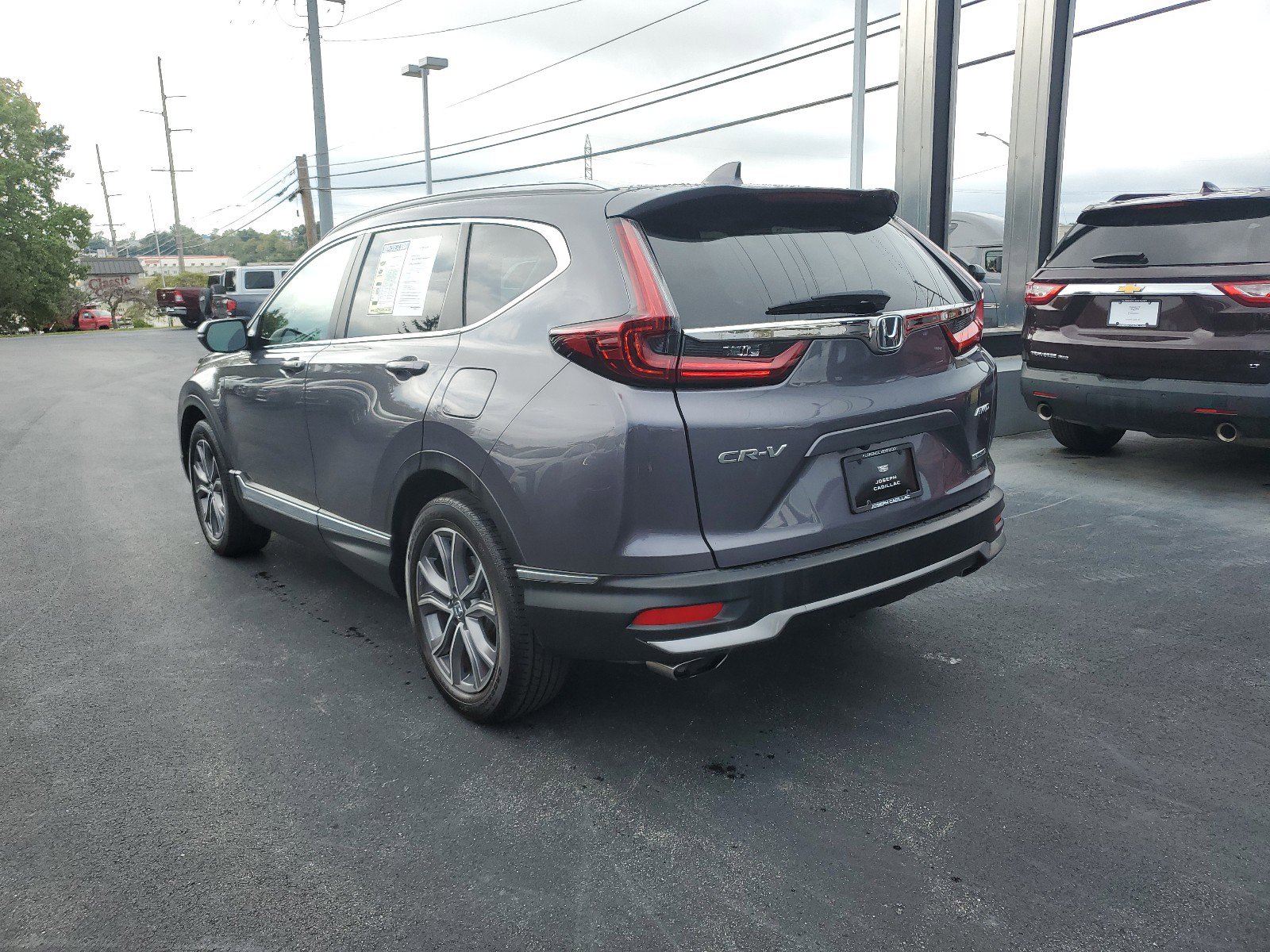 Used 2021 Honda CR-V Touring with VIN 2HKRW2H97MH664650 for sale in Florence, KY