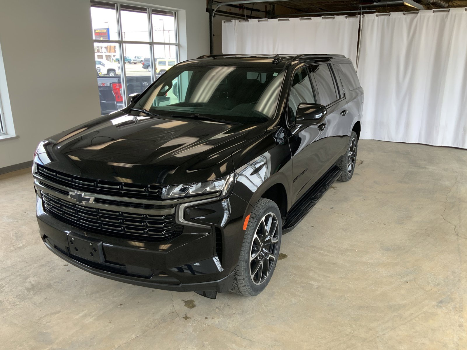 Used 2021 Chevrolet Suburban RST with VIN 1GNSKEKD8MR294384 for sale in Alexandria, Minnesota