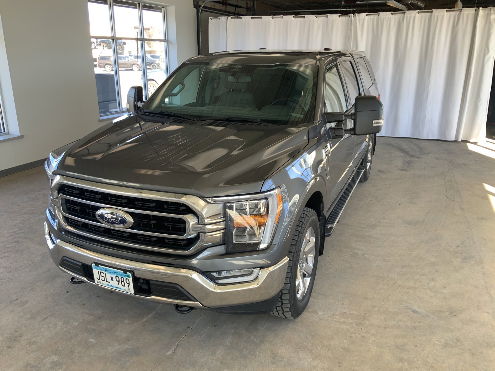 Used 2022 Ford F-150 XLT with VIN 1FTFW1E85NKE45942 for sale in Alexandria, Minnesota