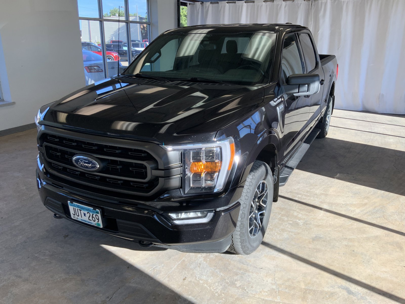 Used 2022 Ford F-150 XLT with VIN 1FTFW1E88NKE46826 for sale in Alexandria, Minnesota