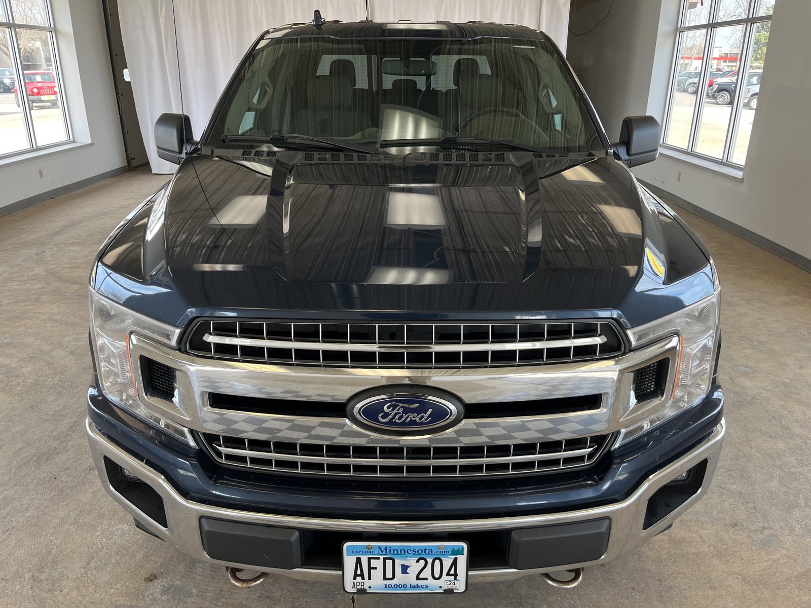 Used 2018 Ford F-150 XLT with VIN 1FTEW1EGXJFA04605 for sale in Alexandria, Minnesota