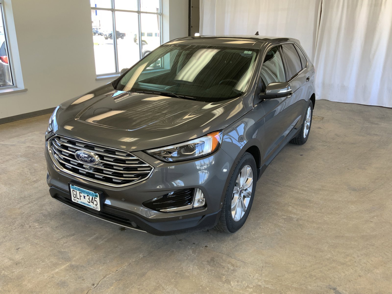 Used 2021 Ford Edge Titanium with VIN 2FMPK4K96MBA35475 for sale in Alexandria, Minnesota