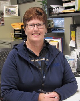 Staff member Gloria Capron from 450633ef5bb7