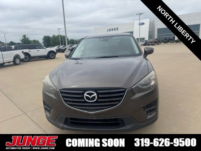 Used 2016 Mazda CX-5 Grand Touring with VIN JM3KE4DY2G0796267 for sale in Hiawatha, IA