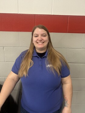 Staff member Alicia Thomas from ID_5d69eff64ca2