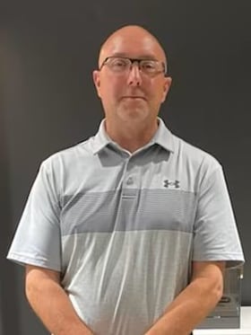Staff member Chris Newby from ID_3cb328f896a7