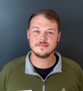 Staff member Aaron Cooper from ID_0a784c493f79