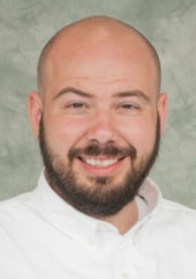 Staff member John Andrews from 1b0343c9aefe