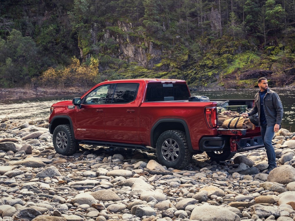  Person cheerfully signing documents.