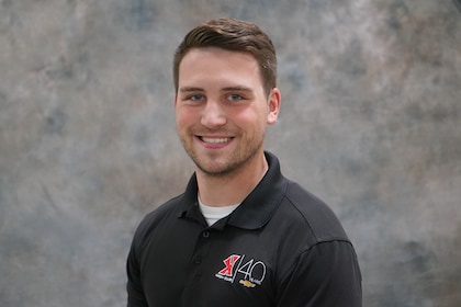 Staff member TYLER WALLACE from ID_c33a25404617