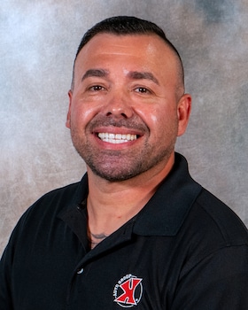 Staff member GREG MARTINEZ from ID_c33a25404617