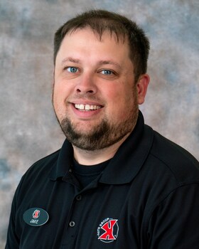 Staff member JAKE NADING from ID_c33a25404617