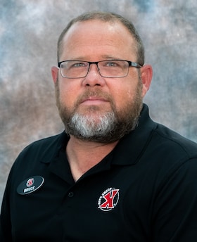Staff member BRUCE STONE from ID_c33a25404617