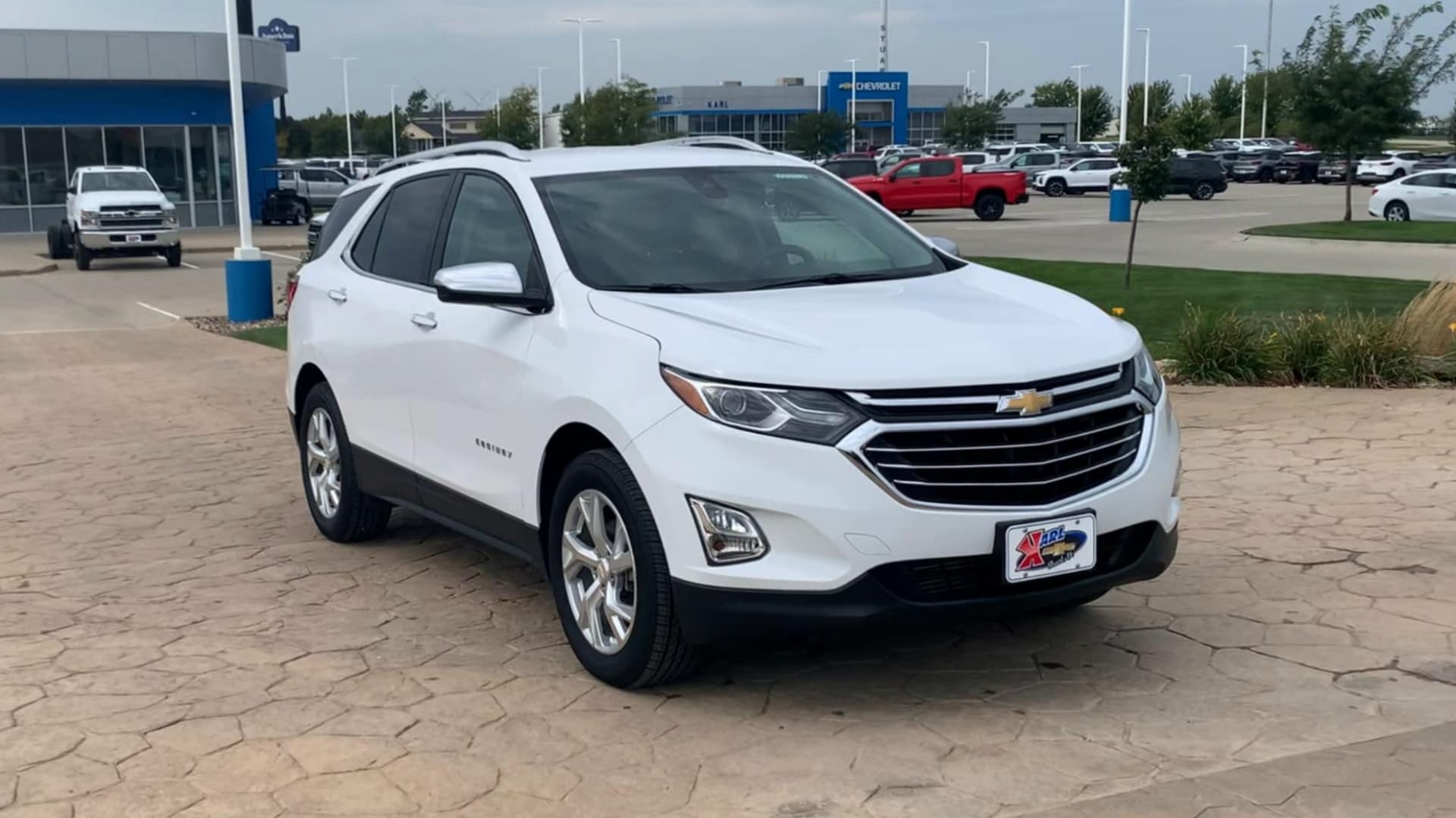 Used 2018 Chevrolet Equinox Premier with VIN 2GNAXVEV7J6185875 for sale in Stuart, IA